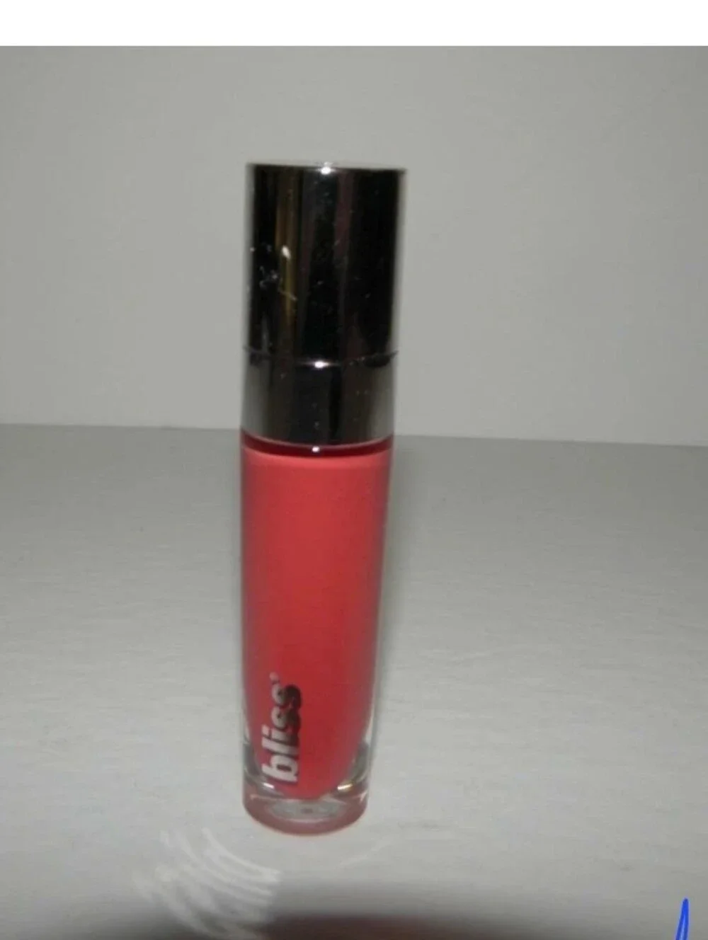 BLISS Bold Over Long Wear Liquefied Lipstick in CANDY CORAL KISSES (Full Size)